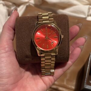 Michael Kors Gold Watch with Vibrant Red Face